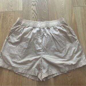 Aritzia TNA  Claremont running Shorts in Sand Bluff - S